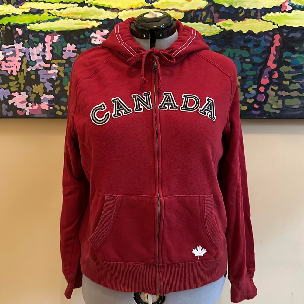 Full zip never worn Canada sweatshirt from Roots.